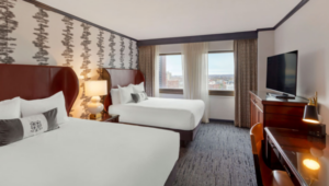 Hotel room with two beds.