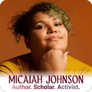 Person with curly green hair and a confident expression resting their chin on their hand, wearing a mustard yellow top against an orange background